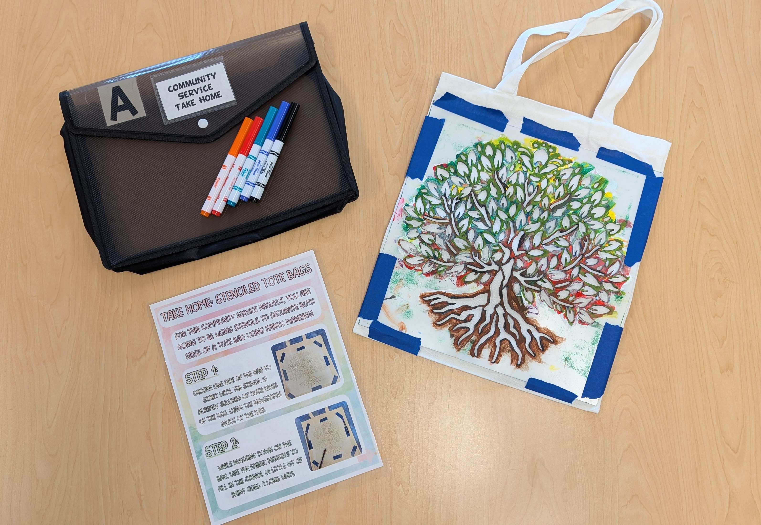 Community Service Take Home Kit with a tote bag and markers