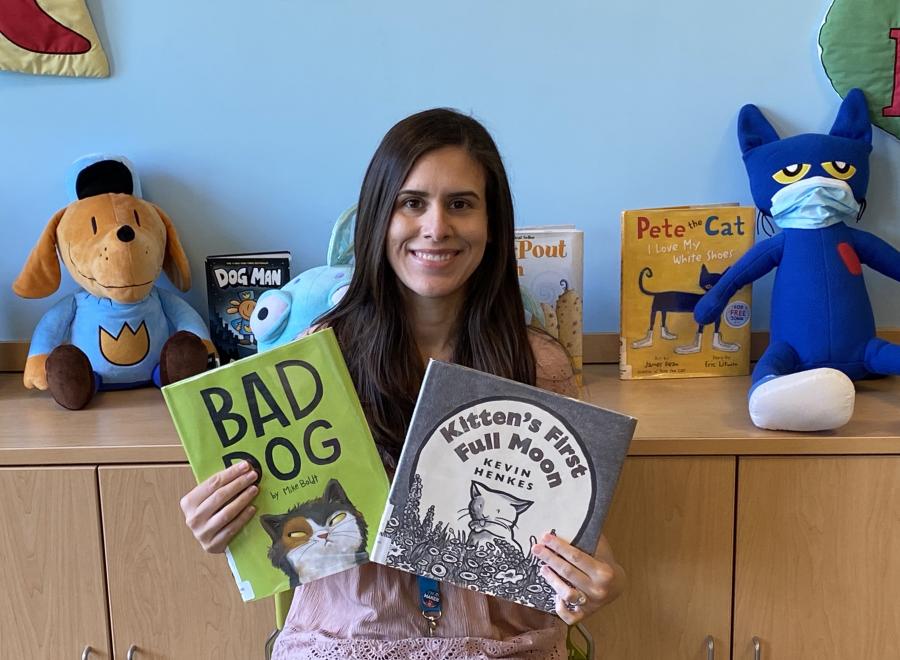 Miss Danielle holding books