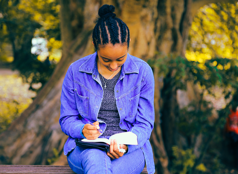 Teen reading a book